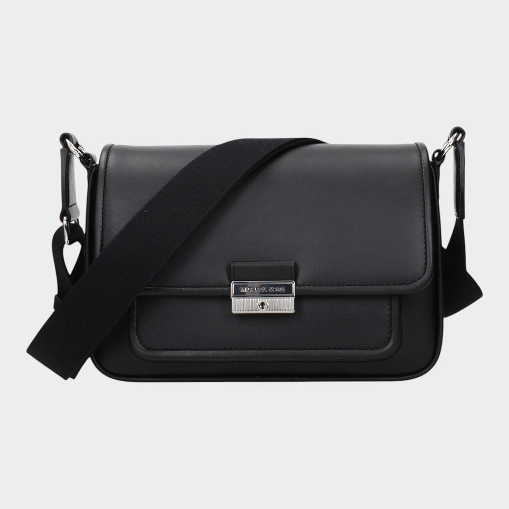 Esmire & Co Michael Kors black leather crossbody bag with front logo and adjustable shoulder strap