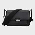 Esmire & Co Michael Kors black leather crossbody bag with front logo and adjustable shoulder strap