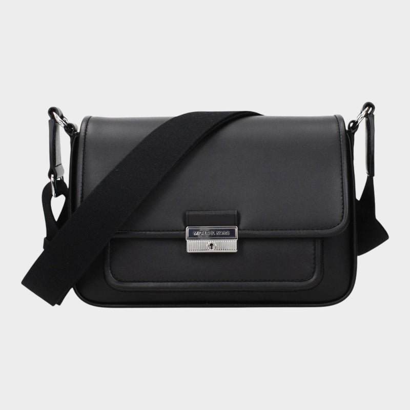 Esmire & Co Michael Kors black leather crossbody bag with front logo and adjustable shoulder strap