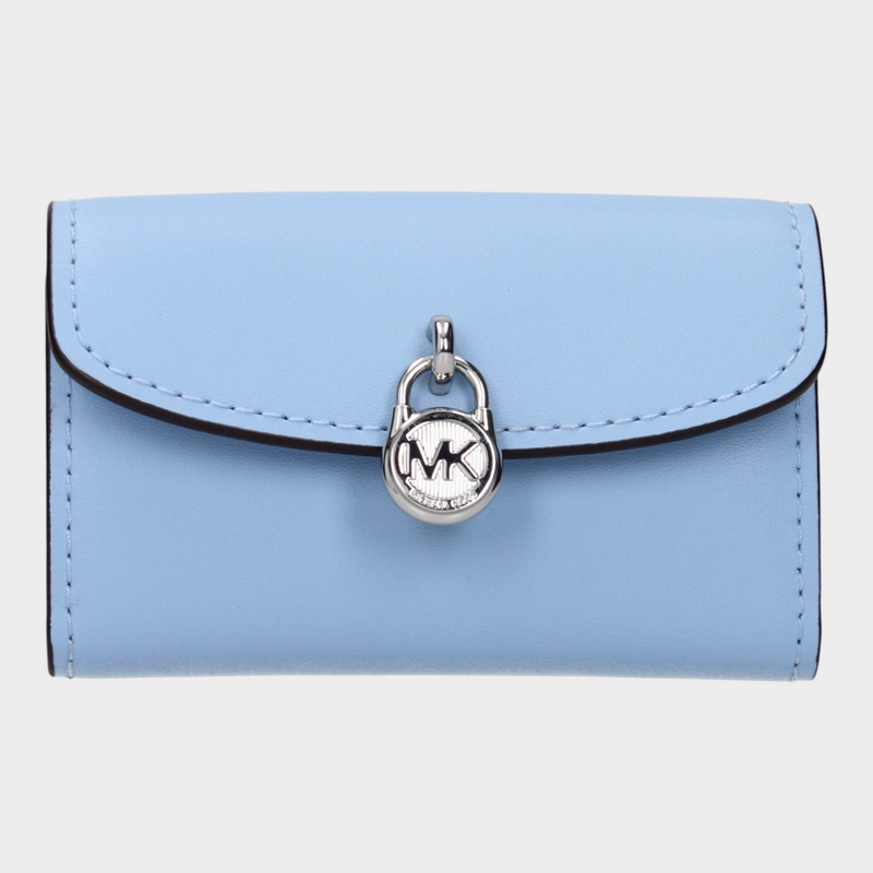 Esmire & Co Michael Kors light blue leather coin purse with a silver logo padlock clasp and minimalist design.