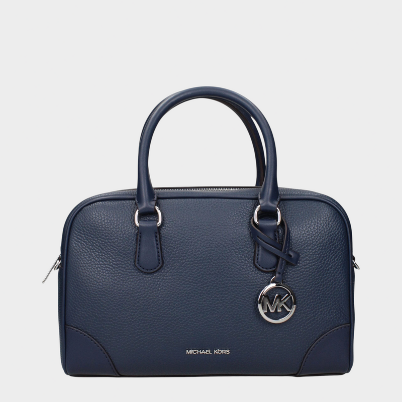 Esmire & Co Michael Kors blue leather handbag with silver logo charm, top handles, and adjustable shoulder strap