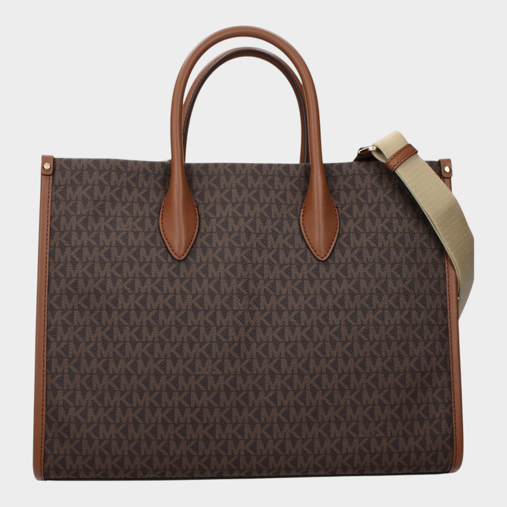 Esmire & Co Michael Kors brown logo fabric tote bag with tan leather handles and an adjustable shoulder strap.
