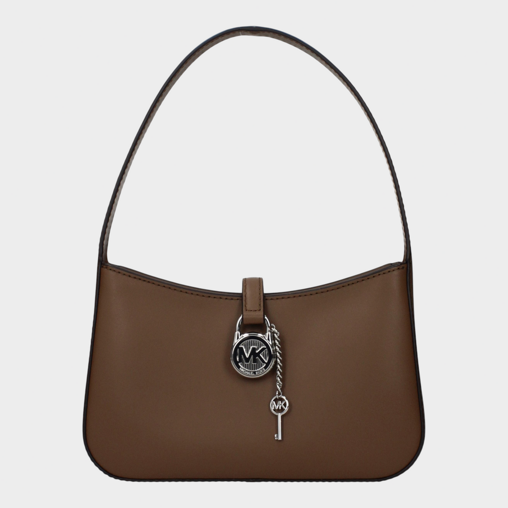 Esmire & Co Michael Kors Driftwood brown smooth leather handbag with a silver logo padlock and key charm detail.