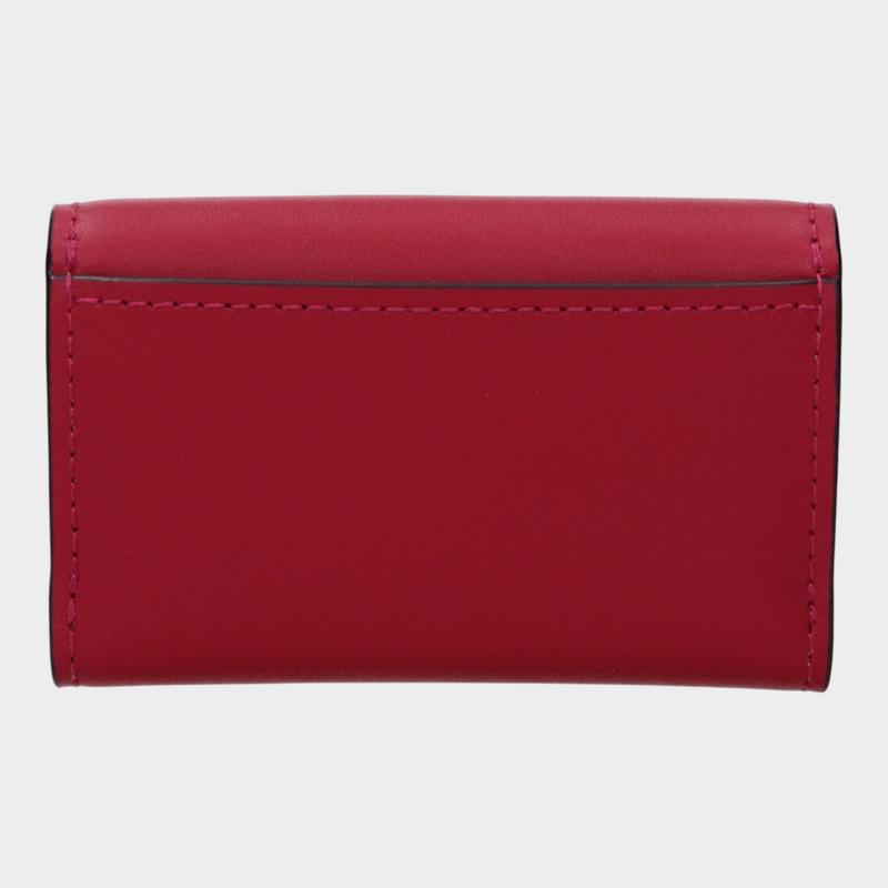 Esmire & Co Michael Kors raspberry red leather coin purse with a minimalist design and external pocket
