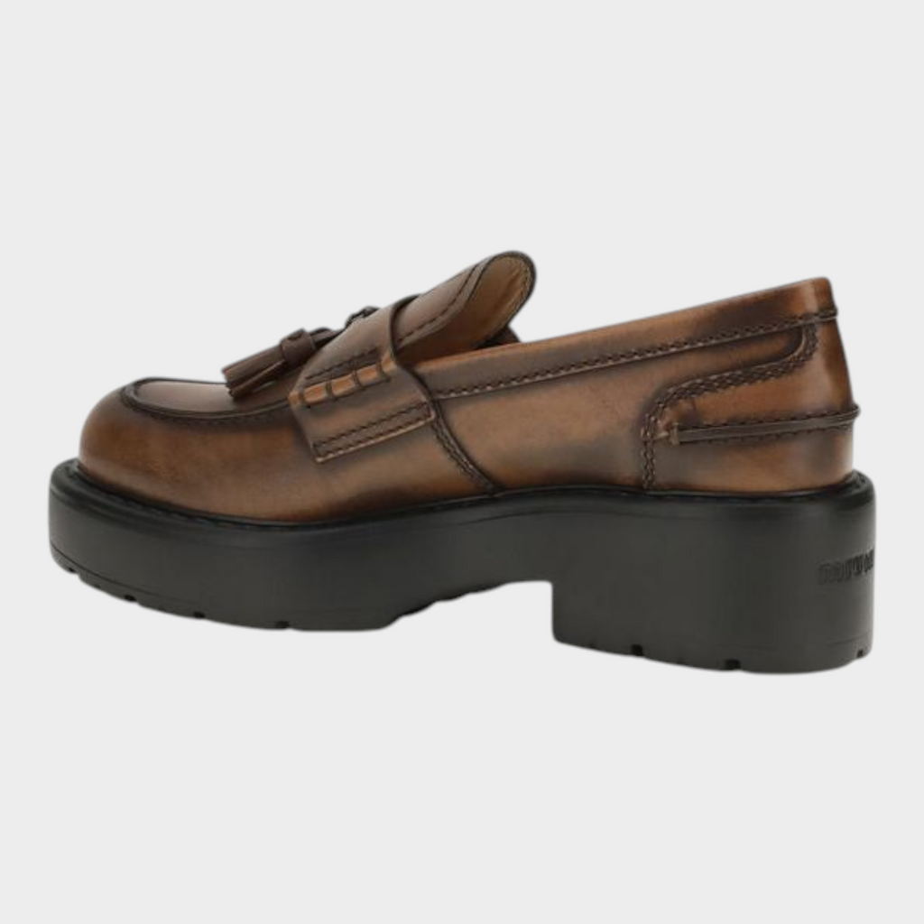 Esmire & Co Miu Miu brown calf leather platform loafers with tassel detail, rounded toe, and chunky lug sole.