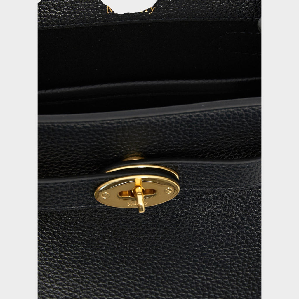 Esmire & Co Mulberry Small Islington black hammered calfskin bucket bag featuring a gold-tone Postman's Lock detail.