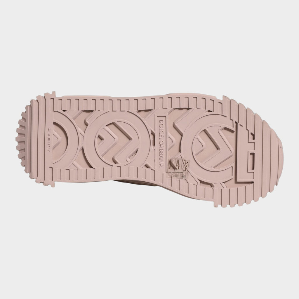 Esmire & Co pink rubber sneaker sole with Dolce & Gabbana logo branding and ridged tread pattern