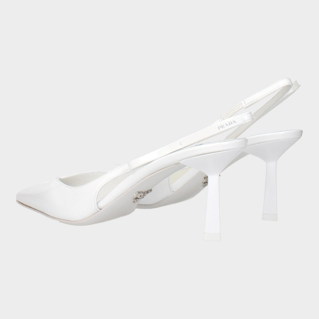Esmire & Co Prada white patent leather slingback pumps with a pointed toe and side logo detail
