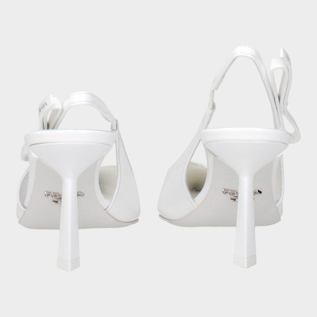 Esmire & Co Prada white patent leather slingback sandals with a sculpted high heel and side logo detail