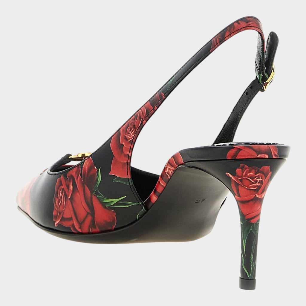 Esmire & Co Dolce & Gabbana calfskin slingback pumps with red rose print, gold DG logo, and 60mm stiletto heel.