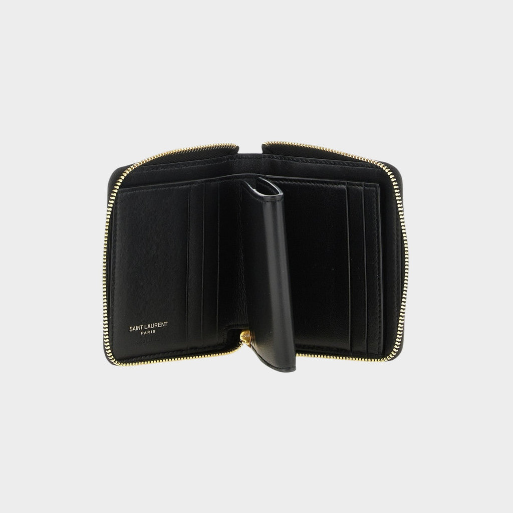 Esmire & Co Saint Laurent black quilted leather zip around wallet interior with card slots and gold hardware