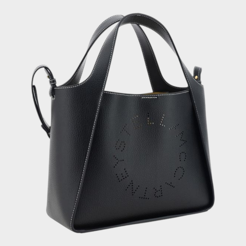 Esmire & Co black grained faux leather Stella McCartney handbag with perforated logo and dual top handles