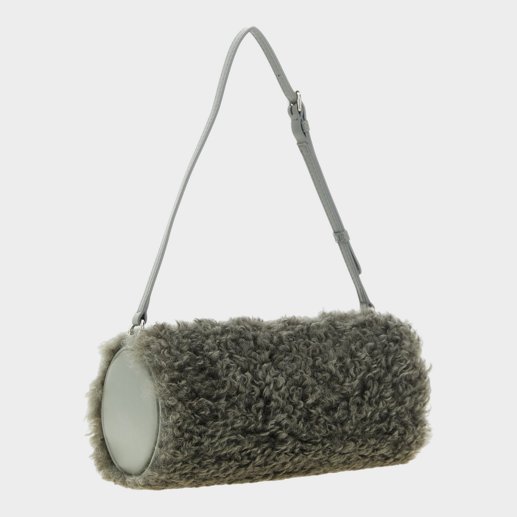 Esmire & Co Stella McCartney gray polyester teddy texture cylindrical clutch bag with an adjustable shoulder strap.