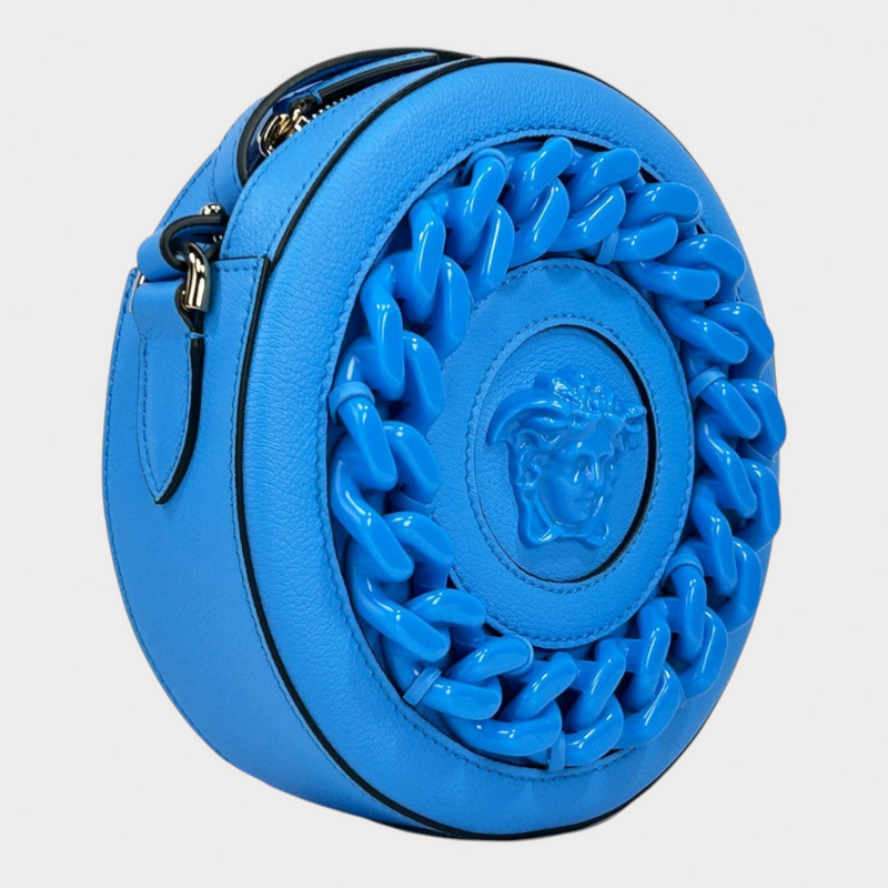 Esmire & Co Versace round blue pebbled leather camera bag featuring a chunky chain detail and Medusa head emblem.