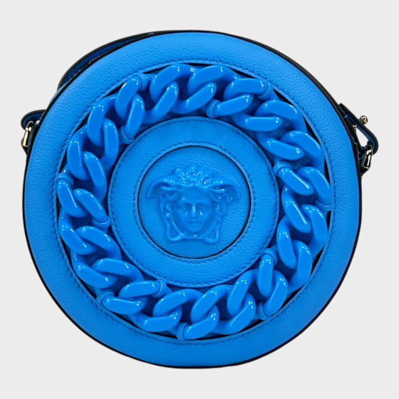 Esmire & Co Versace round blue pebbled leather camera bag with a chunky chain detail and Medusa head emblem.