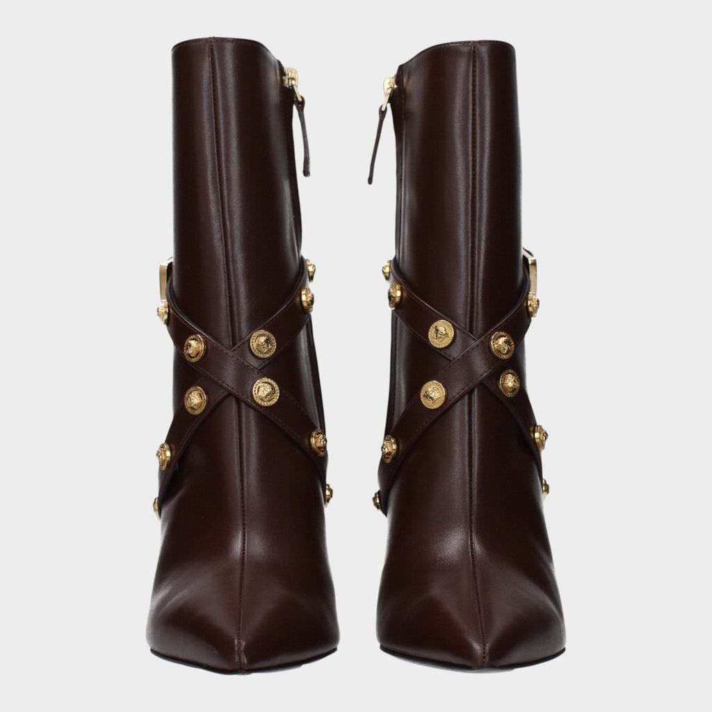 Esmire & Co Versace chocolate brown leather ankle boots with pointed toes and gold Medusa stud strap detailing