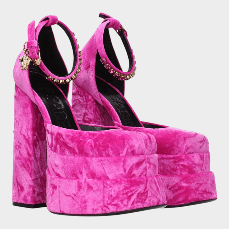 Esmire & Co Versace fuchsia velvet platform heels with rhinestone embellishments and gold-tone buckle detail.