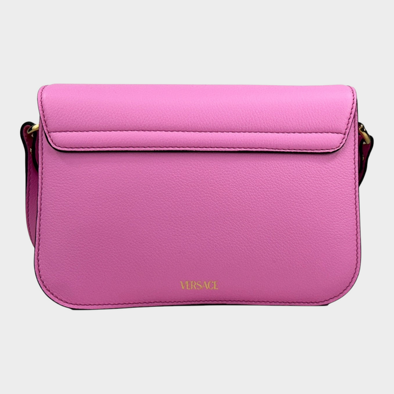Esmire & Co Versace La Medusa pink pebbled leather crossbody bag with gold hardware and magnetic flap closure